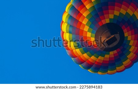 Colorful Hot Air Ballon in Blue Sky  Royalty-Free Stock Photo #2275894183