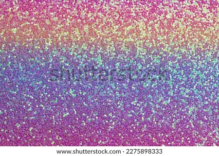 Neon colors. Shimmering glitter full frame background. Holographic texture Royalty-Free Stock Photo #2275898333