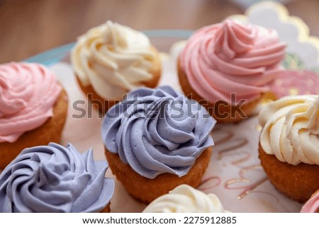 Top view of colorful cupcakes freshly made for Birthday party in a selective focus - Image