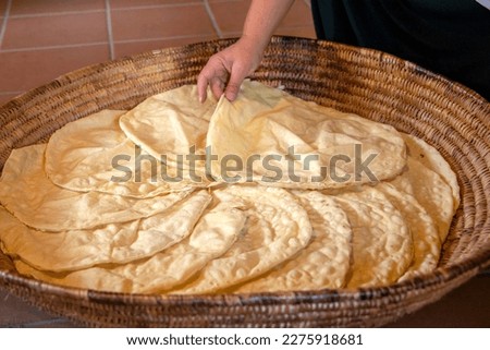 preparation of Sardinian Pane Carasau, Carasau bread, traditional crispy bread of Sardinia, Italy
 Royalty-Free Stock Photo #2275918681