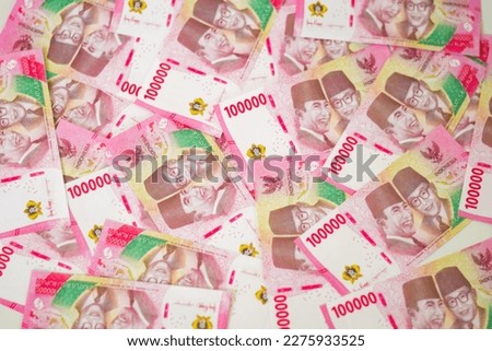 Indonesian rupiah banknotes series with the value of one hundred thousand rupiah IDR 100.000 issued since 2004, Indonesian rupiah for background

 Royalty-Free Stock Photo #2275933525