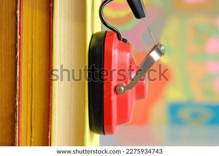 audio book concept with row of books and vintage headphones,close up free copy space