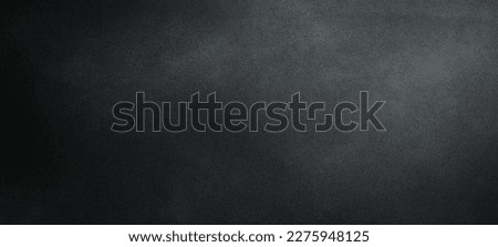 Monochrome black and graphite photo background. Free space for text. Top view. Royalty-Free Stock Photo #2275948125