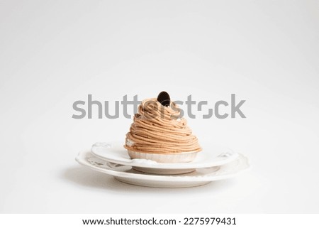 Traditional French Delicious Cake, Mont Blanc , a dessert of sweetened chestnut purée in the form of vermicelli Royalty-Free Stock Photo #2275979431