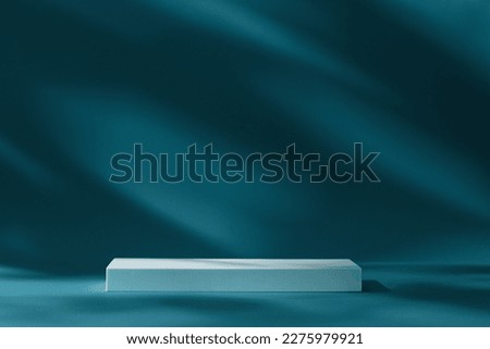 Podium, stand and deep shadow on blue wall background. Background for product. Front view. Mockup. Royalty-Free Stock Photo #2275979921