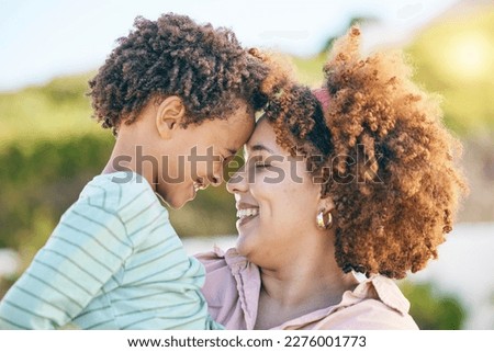 Family, happy and woman hug kid, content together outdoor and face profile with forehead touch. Mother, young child and people with eyes closed, love and care with bond, relationship and smile Royalty-Free Stock Photo #2276001773