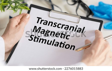 Transcranial Magnetic Stimulation TMS is shown on the photo using the text Royalty-Free Stock Photo #2276015883