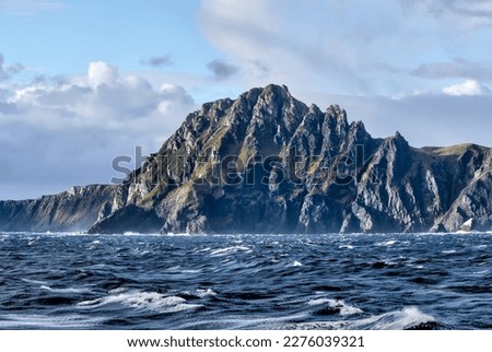Dramatic skies, landscapes and weather off the coast of Cape Horn Argentina Royalty-Free Stock Photo #2276039321