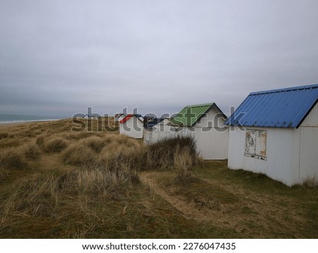 View on huts in Gouville-sur-Mer which is a commune in the Manche department in north-western France
