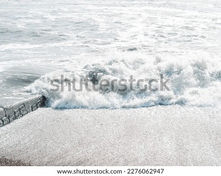 blue sea with waves and sandy shore ,beautiful natural seascape