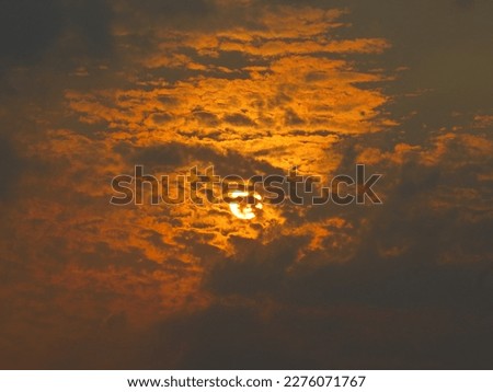 dusky view of the setting sun during sunset in the evening Royalty-Free Stock Photo #2276071767