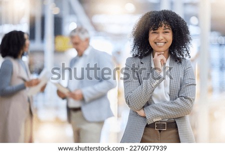 Young business woman, portrait and smile of empowerment, motivation and confident project manager. Happy female employee standing in company for professional career, pride or happiness in busy office Royalty-Free Stock Photo #2276077939
