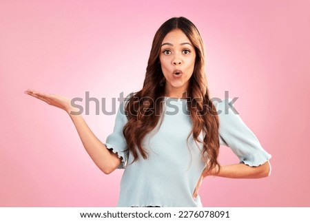 Woman, surprise and marketing in portrait with branding, product placement and promo on pink background. Advertising, logo and brand, mockup and female with wow face, hand out and display in studio