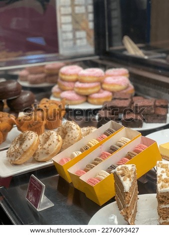 Picture of donuts and the macaroons and cakes and brownies