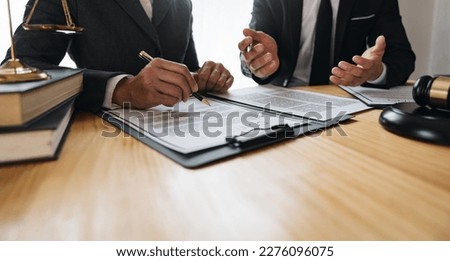 Lawyer, legal advisor, businessman brainstorming clarifying agreement details business contract Joint financial investments in office real estate projects.