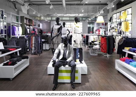 luxury and fashionable brand new interior of cloth store Royalty-Free Stock Photo #227609965