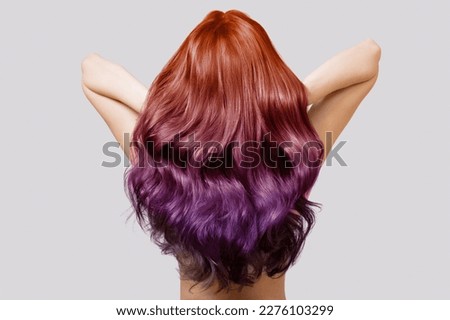 woman with thick wavy hair and a variety of shades of color palette. Coloring in different colors. Ombre Royalty-Free Stock Photo #2276103299