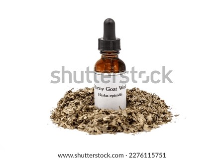 Horny Goat Weed herbal tincture and dried herb isolated on white background.