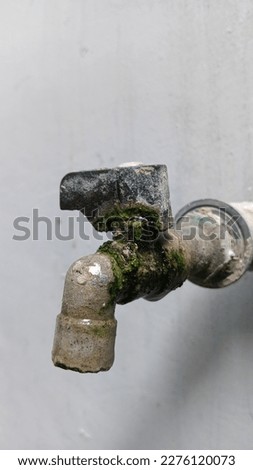 The water faucet that can still be used even though it's mossy

This photo is suitable for backgrounds, business purpose ads, public service announcements, and more