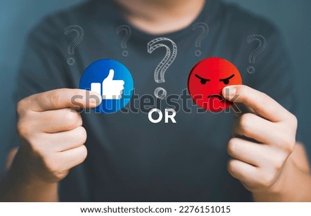 Hand of customer picking Like or angry face rate service or products. Wooden circle for positive mindset selection, online business and marketing customer satisfaction review, social network concept. Royalty-Free Stock Photo #2276151015