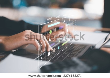 businessperson Updating schedules or planning business online, appointment time management ,work schedule plan ,Strategic Planning Concepts, brainstorm ideas on business plans ,planning software Royalty-Free Stock Photo #2276153271