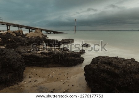 A rocky seascape on an overcast day