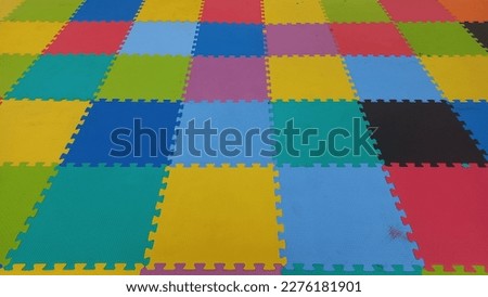 Colorful rubber mats as a mattress
 Royalty-Free Stock Photo #2276181901