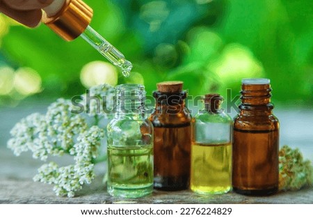 Tincture of yarrow in a bottle. Selective focus. Nature. Royalty-Free Stock Photo #2276224829