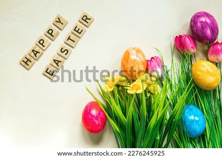Happy Easter text with colorful paineted easter eggs in fresh green grass, Animation, colorful Easter eggs and text on a light background. Video for presentation of Happy Easter. top view