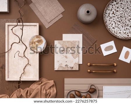 Elegant  flat lay composition in brown and beige color palette with textile and paint samples, lamella panels and tiles. Architect and interior designer moodboard. Top view. Copy space.