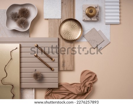 Stylish  flat lay composition in beige and gray color palette with textile and paint samples, panels and tiles. Architect and interior designer moodboard. Top view. Copy space. 