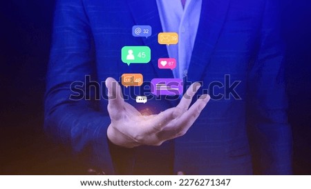 People using social media and digital online marketing concepts with icons such as notifications, messages, comments on the screen.
