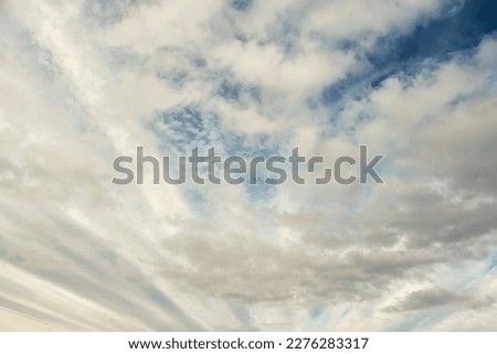 Sky with white clouds. Nature background for design.