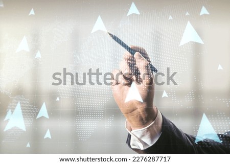 Man hand with pen draws abstract virtual GPS locator sketch with world map on blurred office background, monitoring and tracking concept. Multi exposure