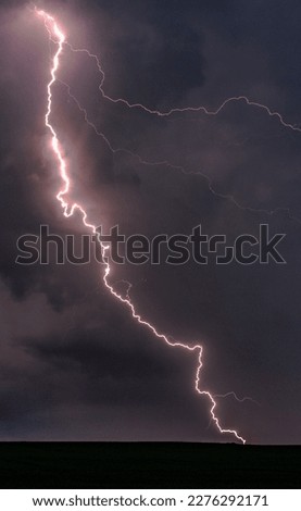 Lightning sparking up the sky during a severe thunderstorm in the UK. 