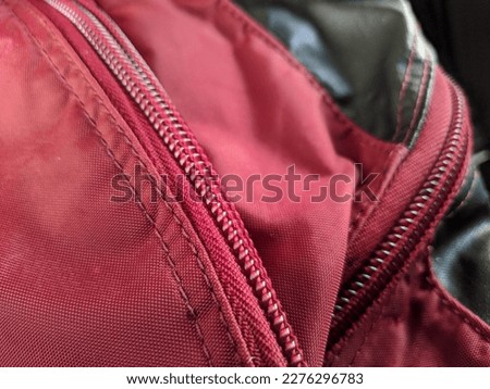 hiking backpack with zippers and pockets closeup photo