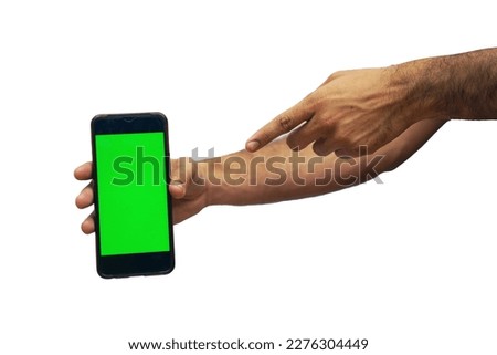 A finger is Pointing toward mobile phone Screen, Mobile green screen, App promotion concept