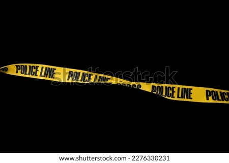 Yellow Belt with black color text message "POLICE LINE DO NOT CROSS" isolated on black background. This has clipping path. 