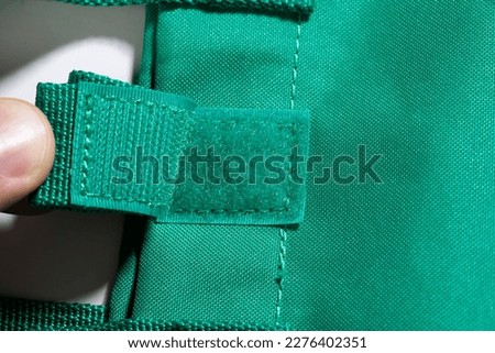 Velcro tape fastener, bag with velcro  Royalty-Free Stock Photo #2276402351
