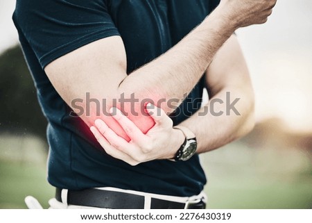 Sports, elbow pain and man on golf course holding arm during game massage and relief in health and wellness. Green, zoom on hands on muscle for support and golfer with ache during golfing workout. Royalty-Free Stock Photo #2276430319
