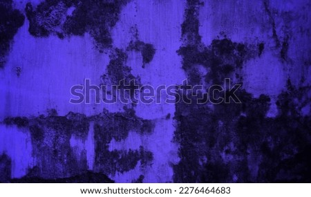 background concept using old cracked wall material in blue color with dark side, peeled off wall surface form abstract art, old wall background full of cracks and moss