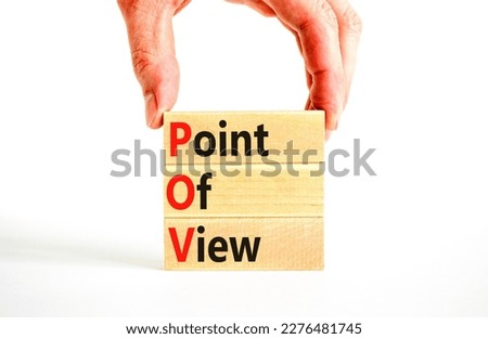 POV point of view symbol. Concept words POV point of view on wooden blocks on a beautiful white table white background. Businessman hand. Business and POV point of view concept. Copy space.