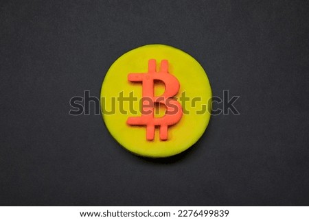 Symbol of bitcoin crypto currency. 3d abstract golden bitcoin coin on black background, btc concept. Financial market and investment.