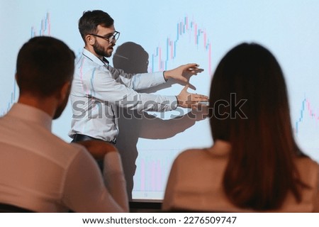 Analyzing data, graphs and reports for investment purposes. Creative teamwork traders Royalty-Free Stock Photo #2276509747