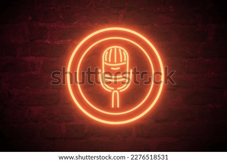 Neon microphone icon with brick wall background 4K high quality, glowing, electric neon, podcasts Royalty-Free Stock Photo #2276518531