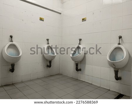 public toilets in the city Royalty-Free Stock Photo #2276588369