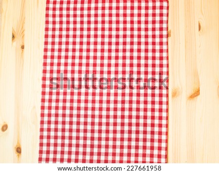 towel white red squares on wooden background