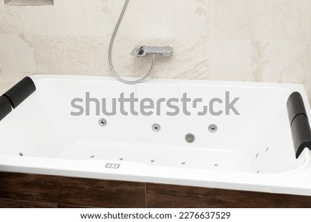 Picture of a jacuzzi bathtub in bathroom of apartment