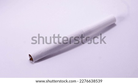 unburnt cigarette isolated white background