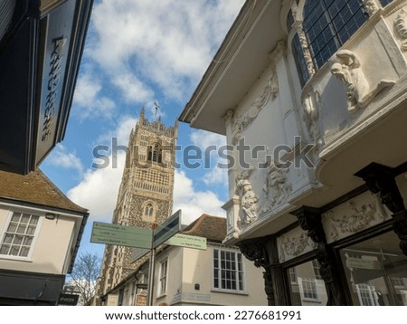 The tower of St Mary-le-Tower Church between the narrow streets of Ipswich, Suffolk, UK Royalty-Free Stock Photo #2276681991